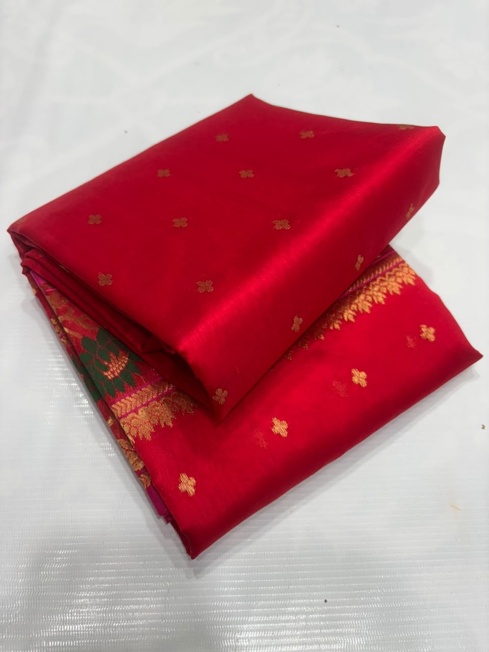 Vermilion Red handloom Pattu Silk Chanderi saree with gold buttas, colourful floral border and luminous gold pallu