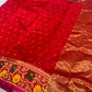 Petite gold buttas on a Vermilion Red handloom Pattu Silk Chanderi saree