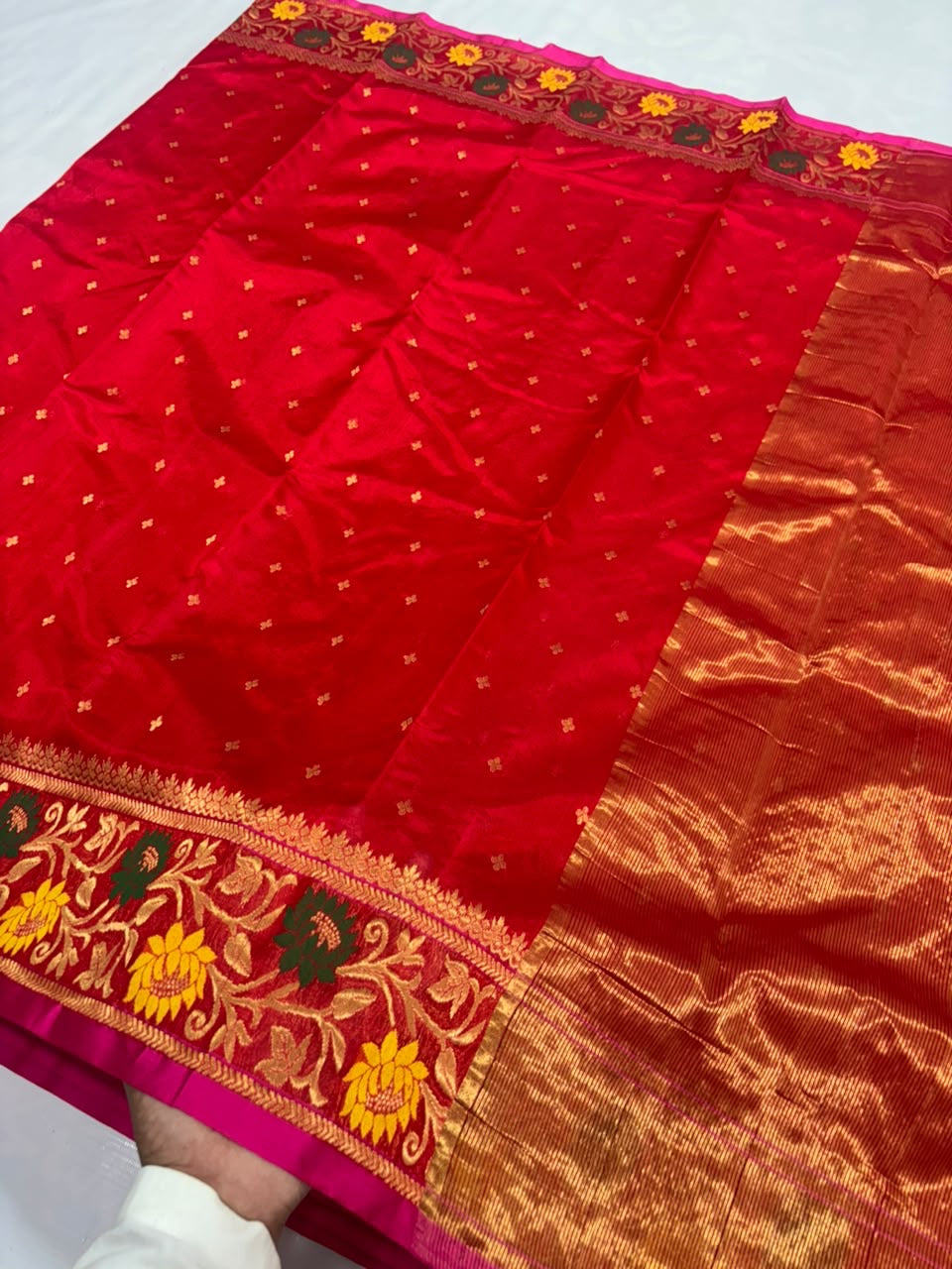 Petite gold buttas on a Vermilion Red handloom Pattu Silk Chanderi saree