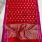 Folded Vermilion Red Chanderi saree showing gold floral motifs and contrasting Rani Pink border.