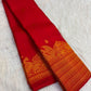 Vermilion Red handwoven pure silk KanchiPattu saree with floral butta motifs — full saree overview — Idam Living