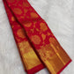 Vermilion red Kanjivaram saree with rich gold zari border and pallu