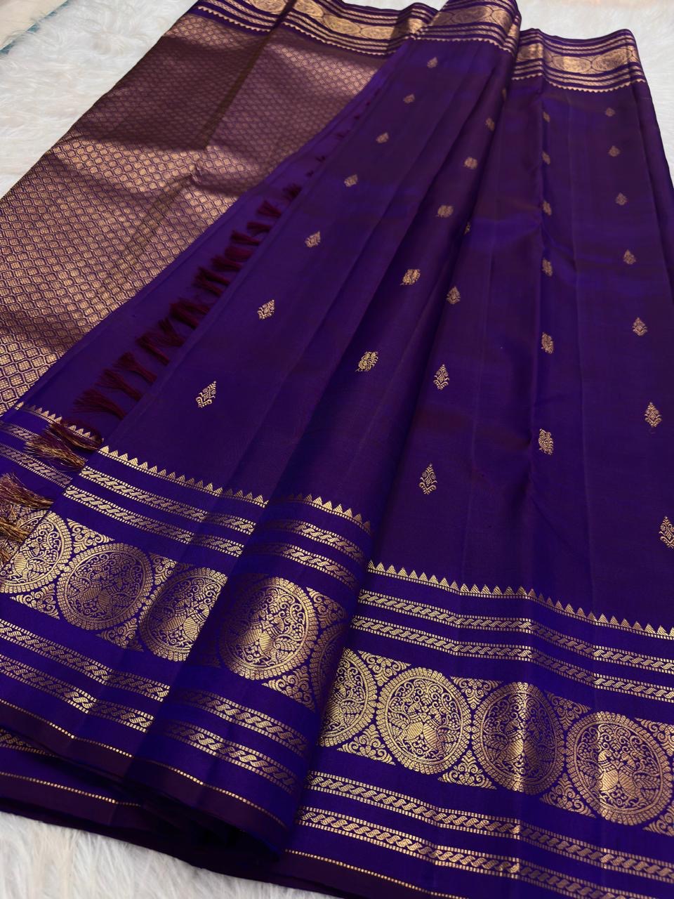 Radiant Neelam Blue pure silk Kanchipuram Varisaipet saree, close-up of gold-toned woven ornament.