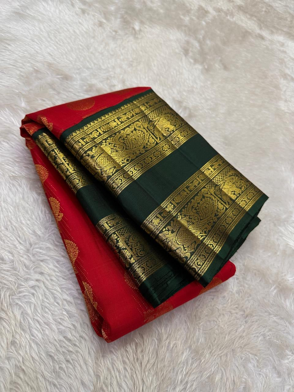 Vermilion red handwoven Pure Silk Kanchipuram Rettapet saree with bottle green border