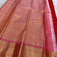 Fine gold Zari Kattam checks woven across the radiant Vermilion Red pure silk body.