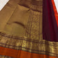 Vermilion Red Kanjeevaram Saree — deep aubergine Korvai border with elephant motifs and floral detailing