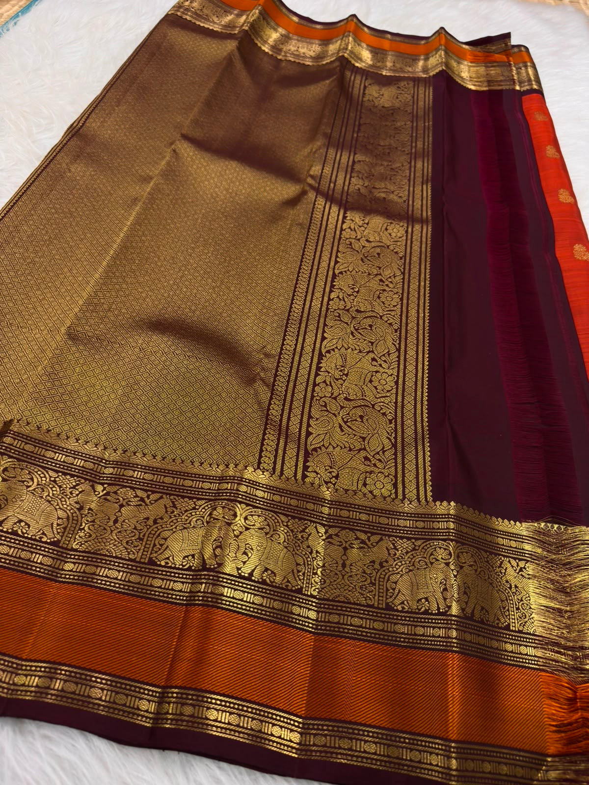 Vermilion Red Kanjeevaram Saree — deep aubergine Korvai border with elephant motifs and floral detailing