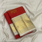 Vermilion Red Kanjivaram saree with large traditional cow zari buttas