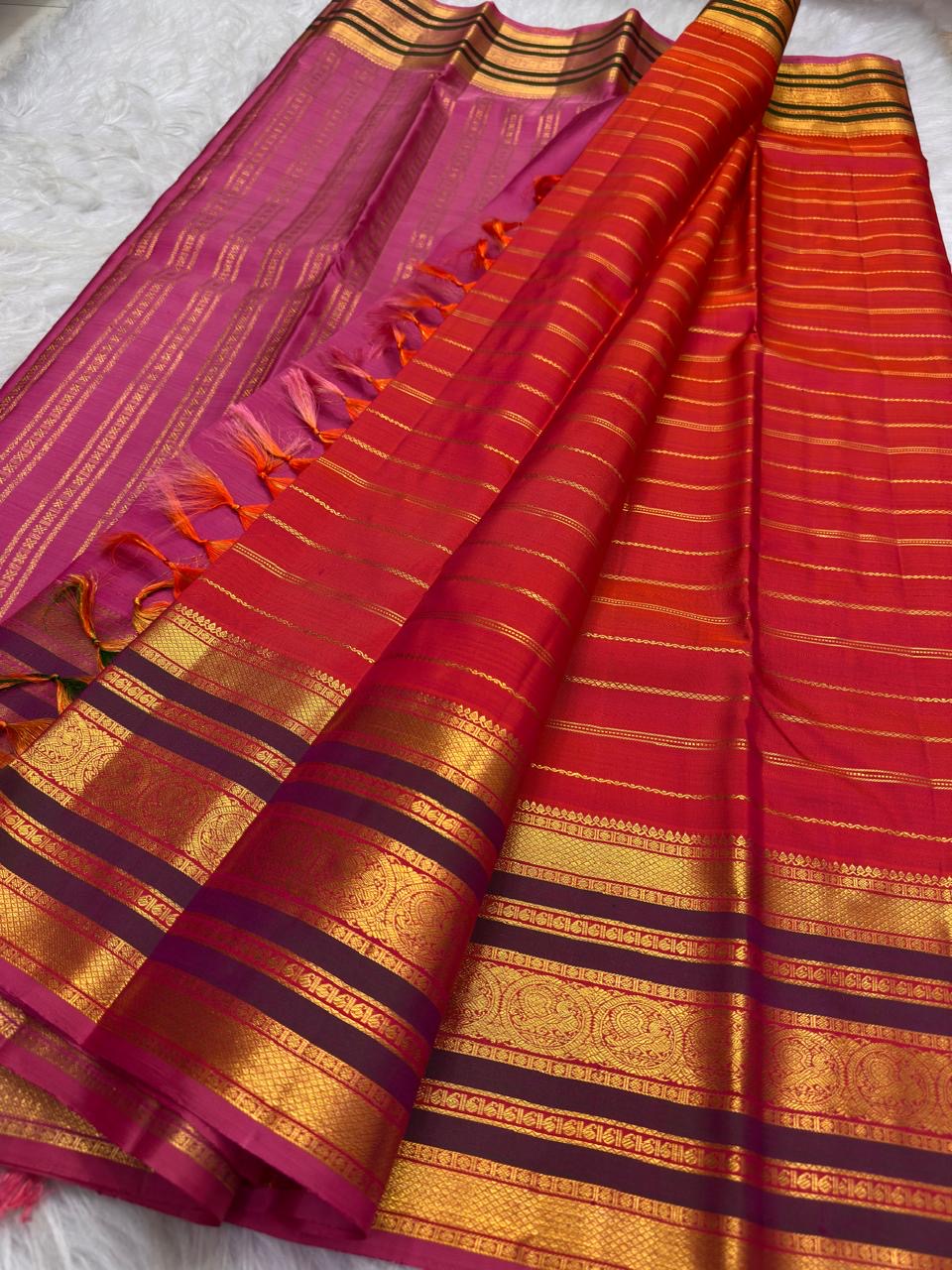 Traditional red gold Pure Silk Kanchipuram saree.
