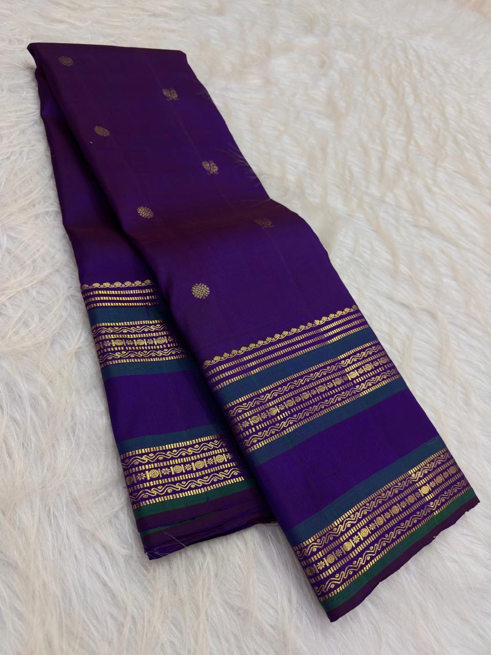 Deep Kathiripoo Purple and Emerald Green handwoven pure silk Kanchipuram Varisaipet saree with zari mayil chakram buttas, image 1.