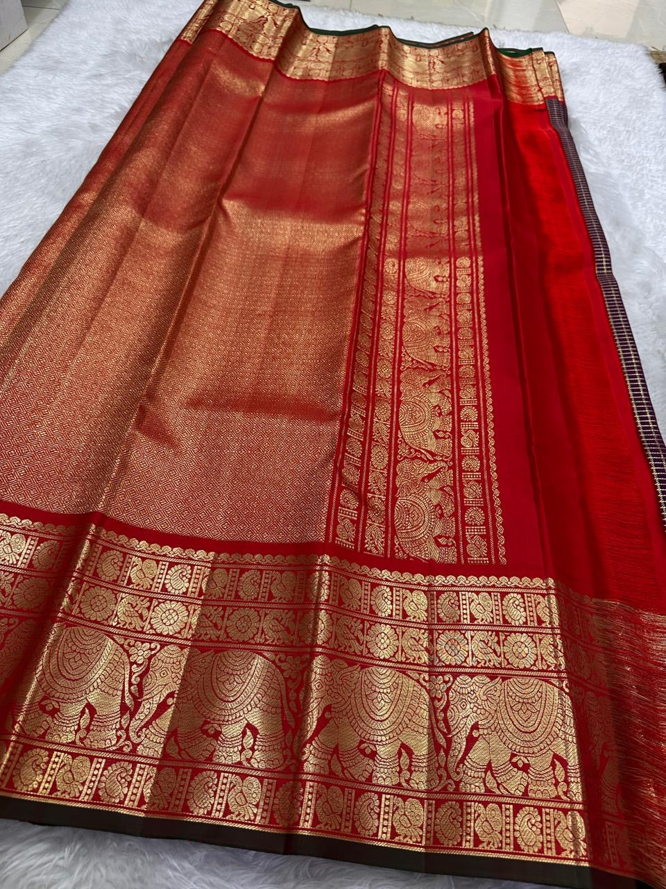 Vermilion Red Kanchipuram border with large traditional gold zari elephant motifs