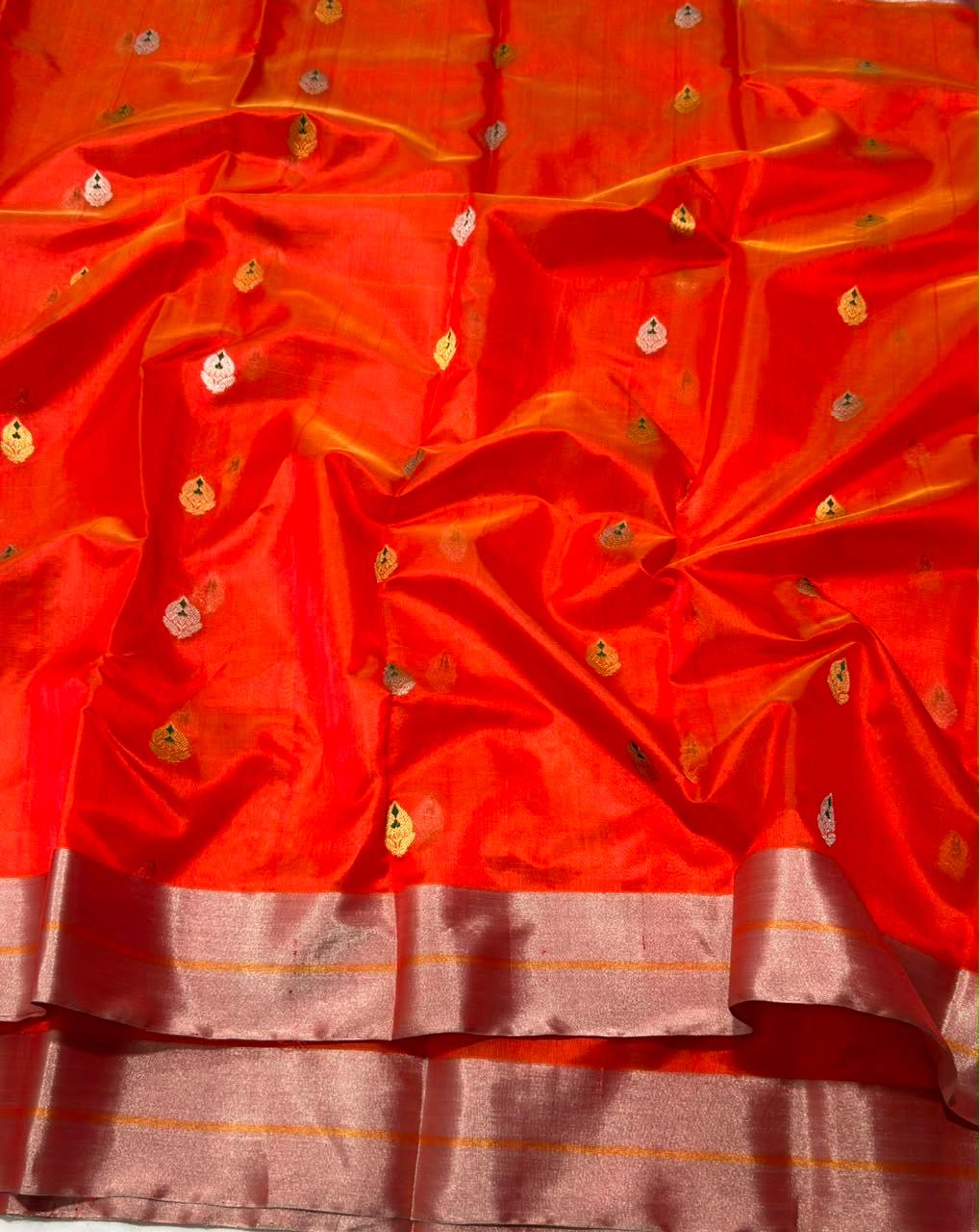 Vermilion Red handloom Pattu Silk Chanderi saree with alternating gold and silver leaf buttas and metallic border