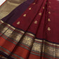 Vermilion Red pure silk Kanjivaram saree, Butta weave with Deep Aubergine border — folded view