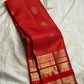 Full red Zari Kattam Kanchipuram saree showing structured grid body and ornate gold zari border.