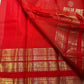 Close view of alternating Sona Rupa buttas positioned within the fine zari-grid silk body.