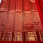 Red Kanchipuram saree border with repeated mayil motifs and layered geometric zari bands.