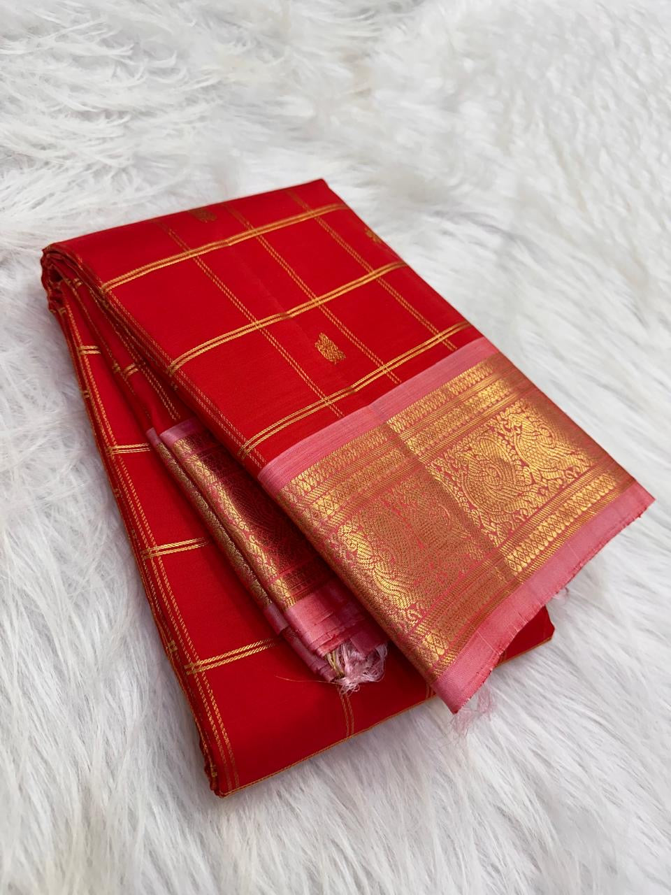 Vermilion Red pure silk surface showing its warm kumkum-like tone and natural silk sheen.