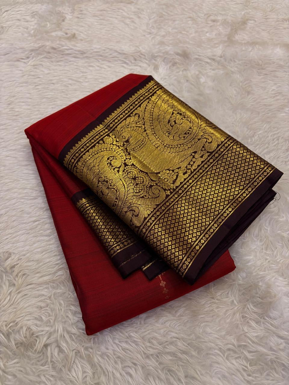 Vermilion Red Handwoven Pure Silk Kanjivaram Saree with Gold Buttas and Deep Brown Peacock Zari Border