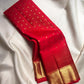 Vermilion Red Pure Silk Kanjivaram Butta saree with antique gold zari buttas