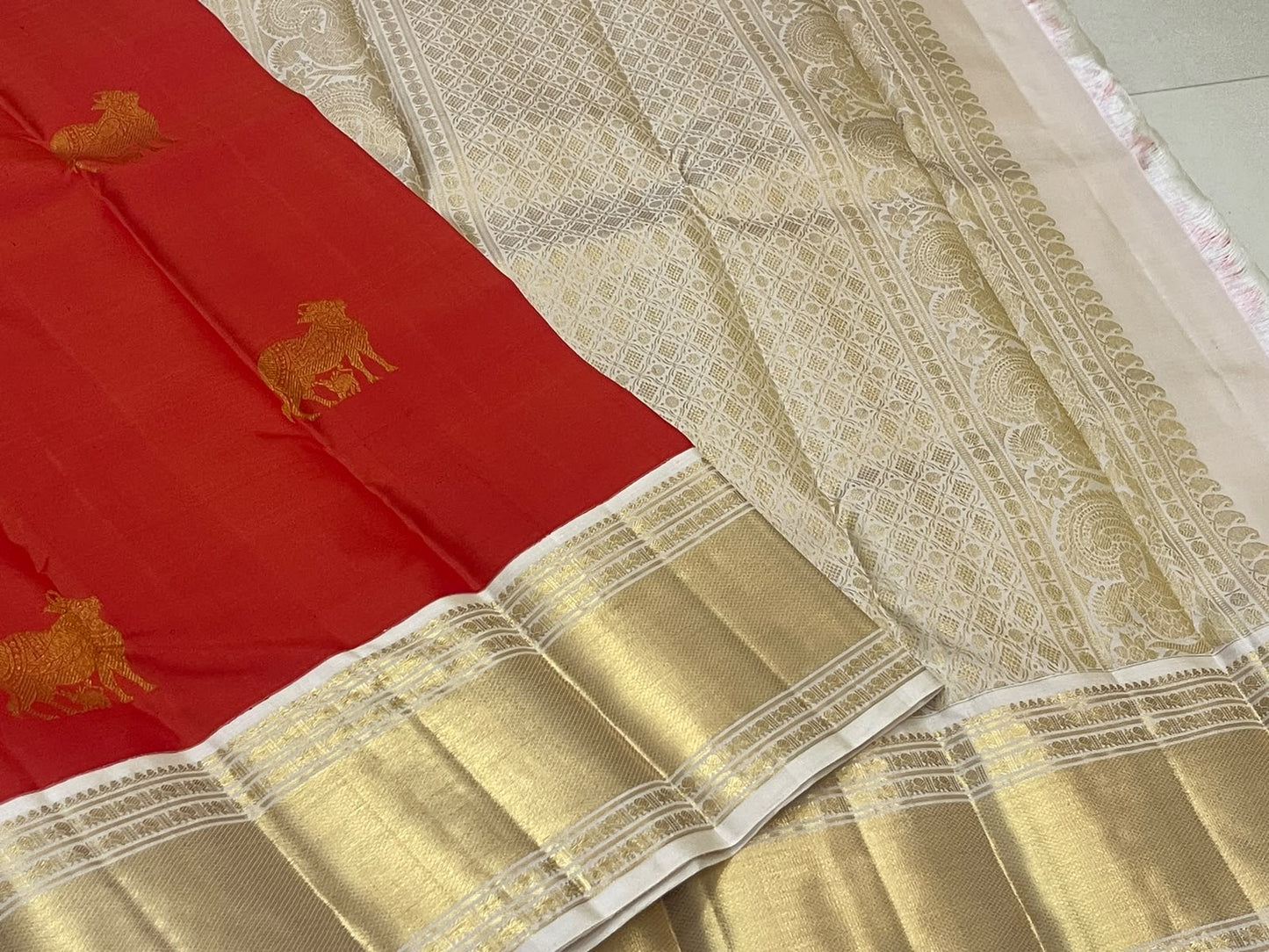 Vermilion Red Pure Silk Kanjivaram Butta saree with Warm Ivory broad border