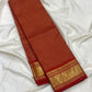 Vermilion Red Kanchipuram silk body woven with fine intersecting gold Zari Kattam checks.