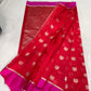 Vermilion Red handloom Pattu Silk Chanderi saree with repeating gold floral buttas, Rani Pink border and metallic pallu.