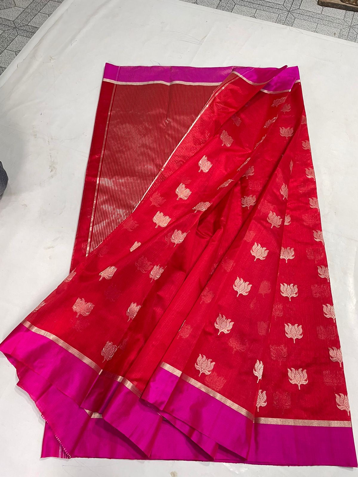 Vermilion Red handloom Pattu Silk Chanderi saree with repeating gold floral buttas, Rani Pink border and metallic pallu.