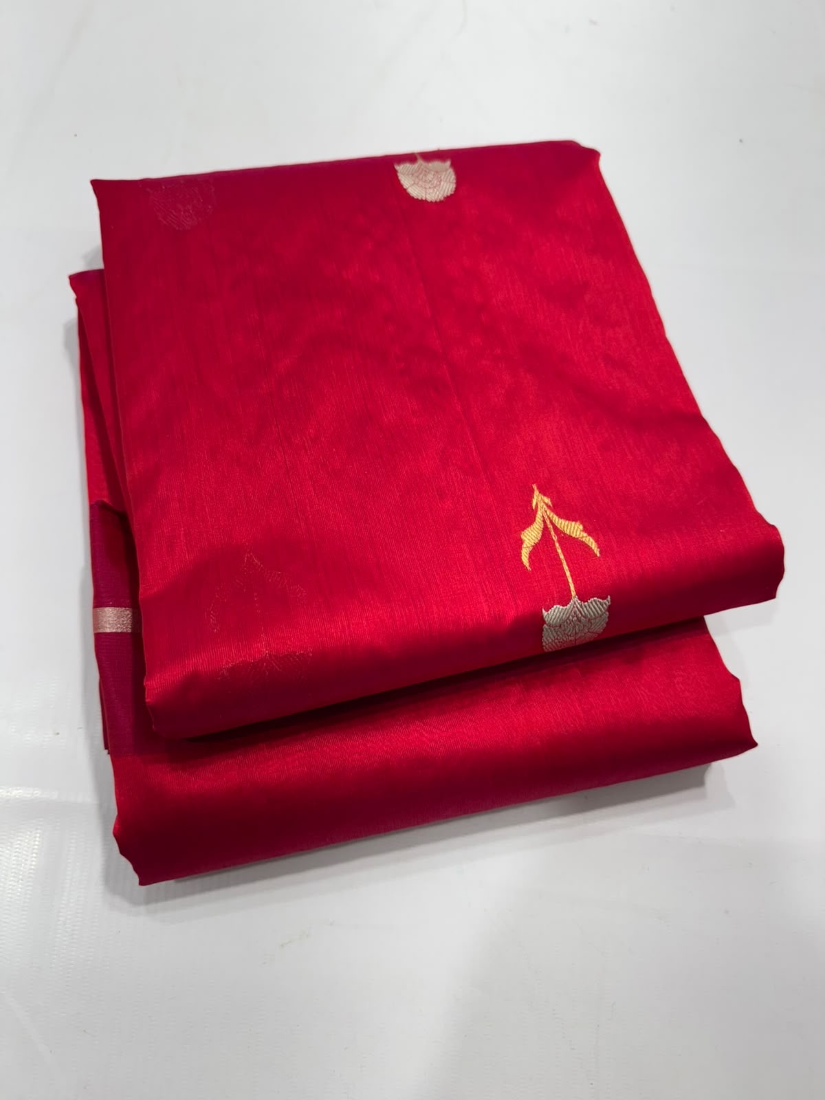 Sweet chilli red and raspberry pink handwoven Pattu Silk Chanderi saree, draped view