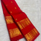 Vermilion red Rettapet KanchiPattu saree with Yazhi border, close-up