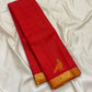 Vermilion red Vairaoosi Kanchipuram saree with Mayil zari motif, close-up