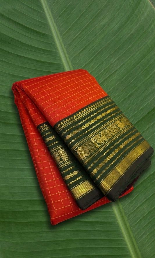 Pure Kanchipuram silk saree in vermilion red with forest green Varisaipet border and antique gold zari