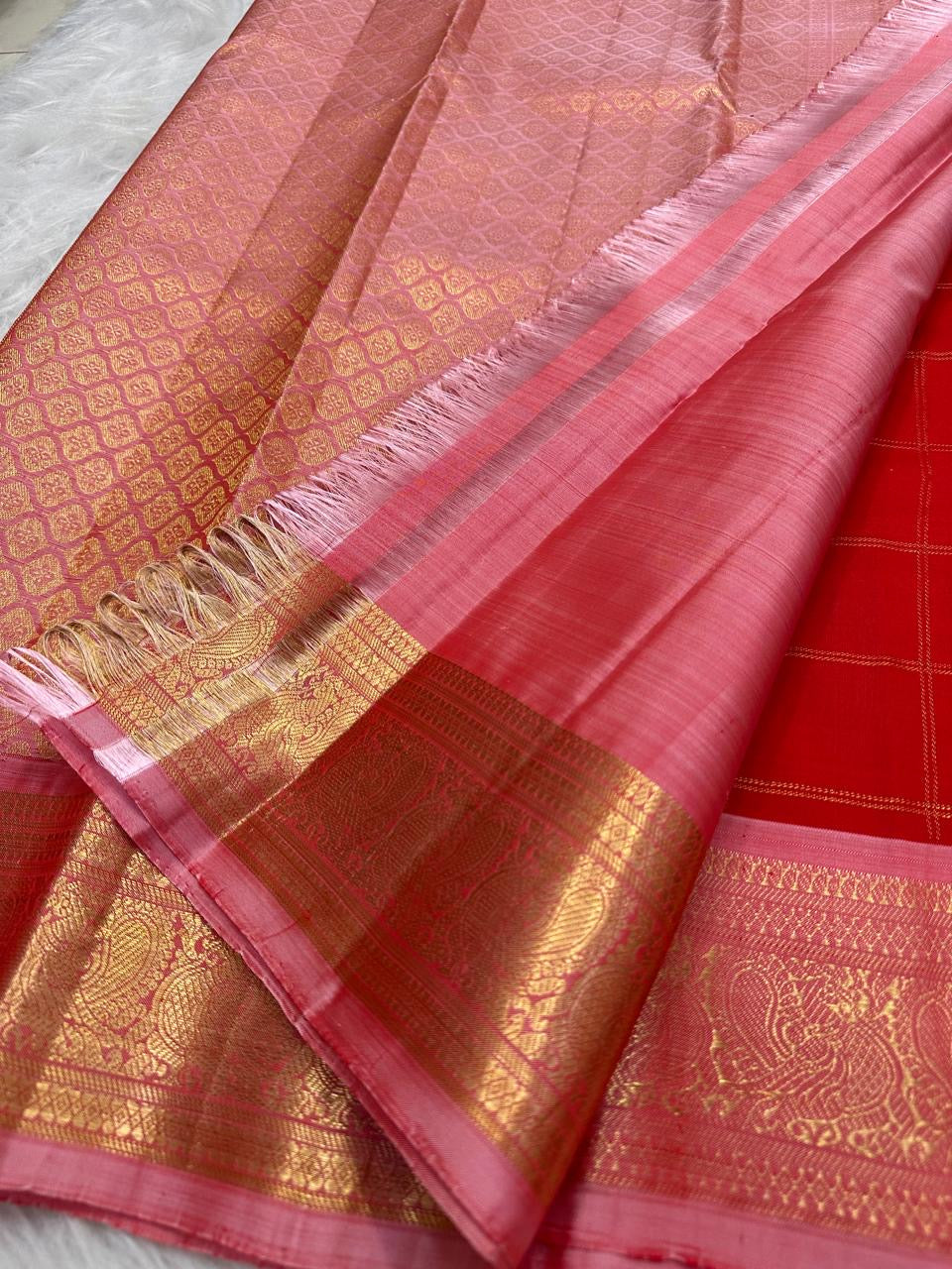 Vermilion Red Pure Silk Kanjeevaram Zari Kattam saree with gold checks and Blush-Pink border edge.