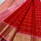 Tiny individual gold zari buttas positioned within the checked Vermilion Red Kanjeevaram body.