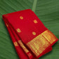Vermillion red Kanchipuram silk saree with antique gold mayil border – front drape view