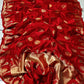 Close view of Vermillion Red Pattu Silk Chanderi saree with gold-toned motifs accented in orange and magenta