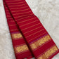 Full view of vibrant red handwoven Kanchipuram pure silk saree with seepu reku body and rettapet border — Idam Living