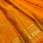 Vintage 2gram zari detail on a Saffron Orange Vairaoosi Kanchipuram saree.