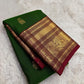 Vintage green Pure Silk Kanchipuram Butta saree with Arakku border and gold zari.