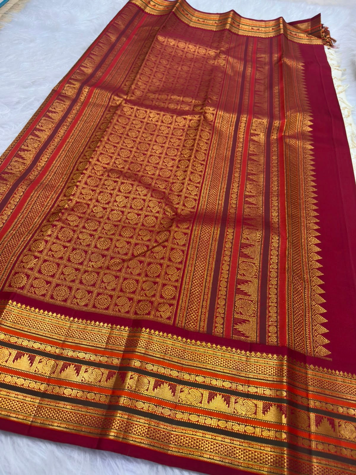 Paisley, peacock and floral zari motifs, warm-ivory Kanchipuram Korvai saree