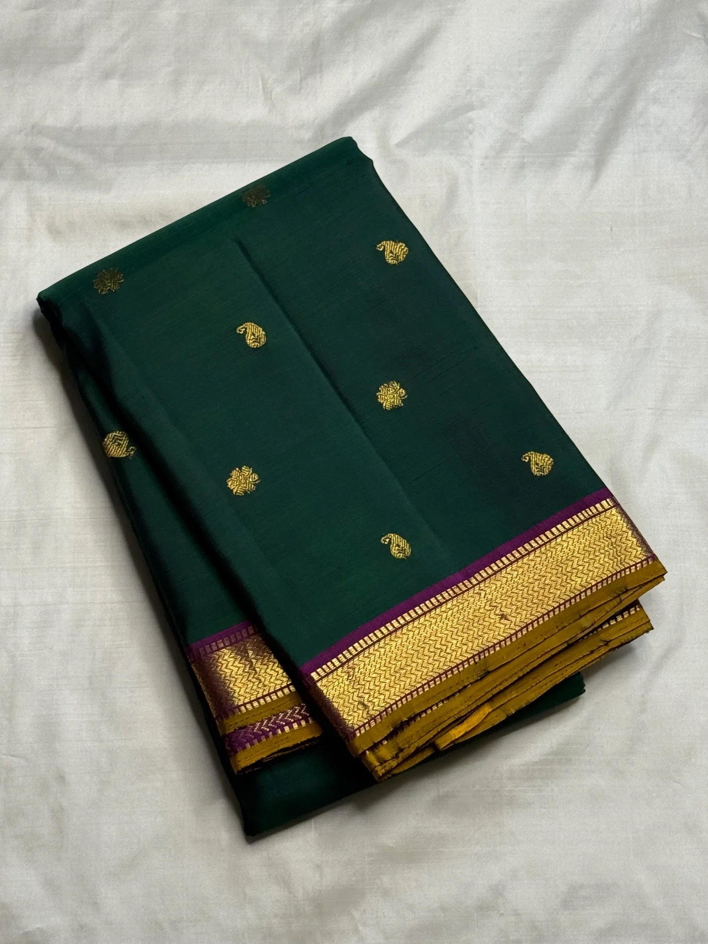 Deep emerald green handwoven pure silk Kanchipuram Butta saree, full view — Idam Living