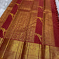 Vintage maroon Kanchipattu handwoven Zari Kattam saree with parrot motif detail.