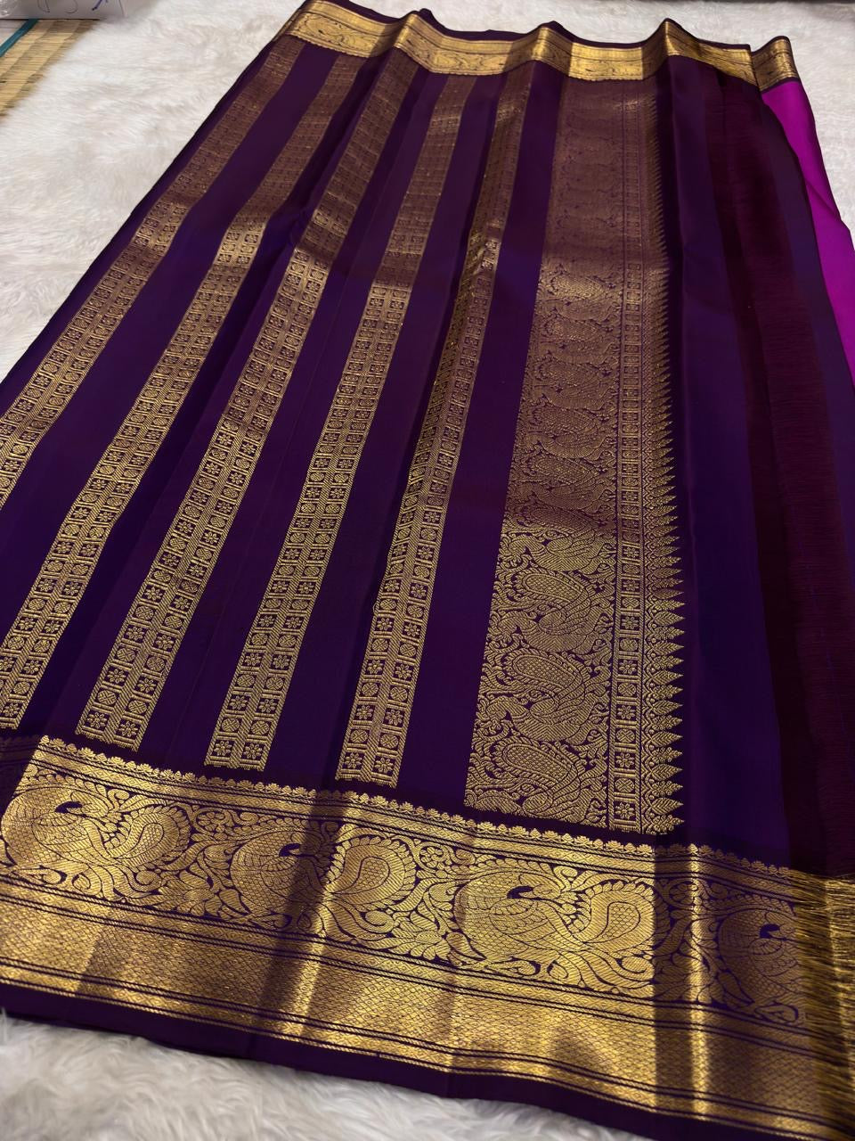 Violet border Kanchipattu silk saree – folded view