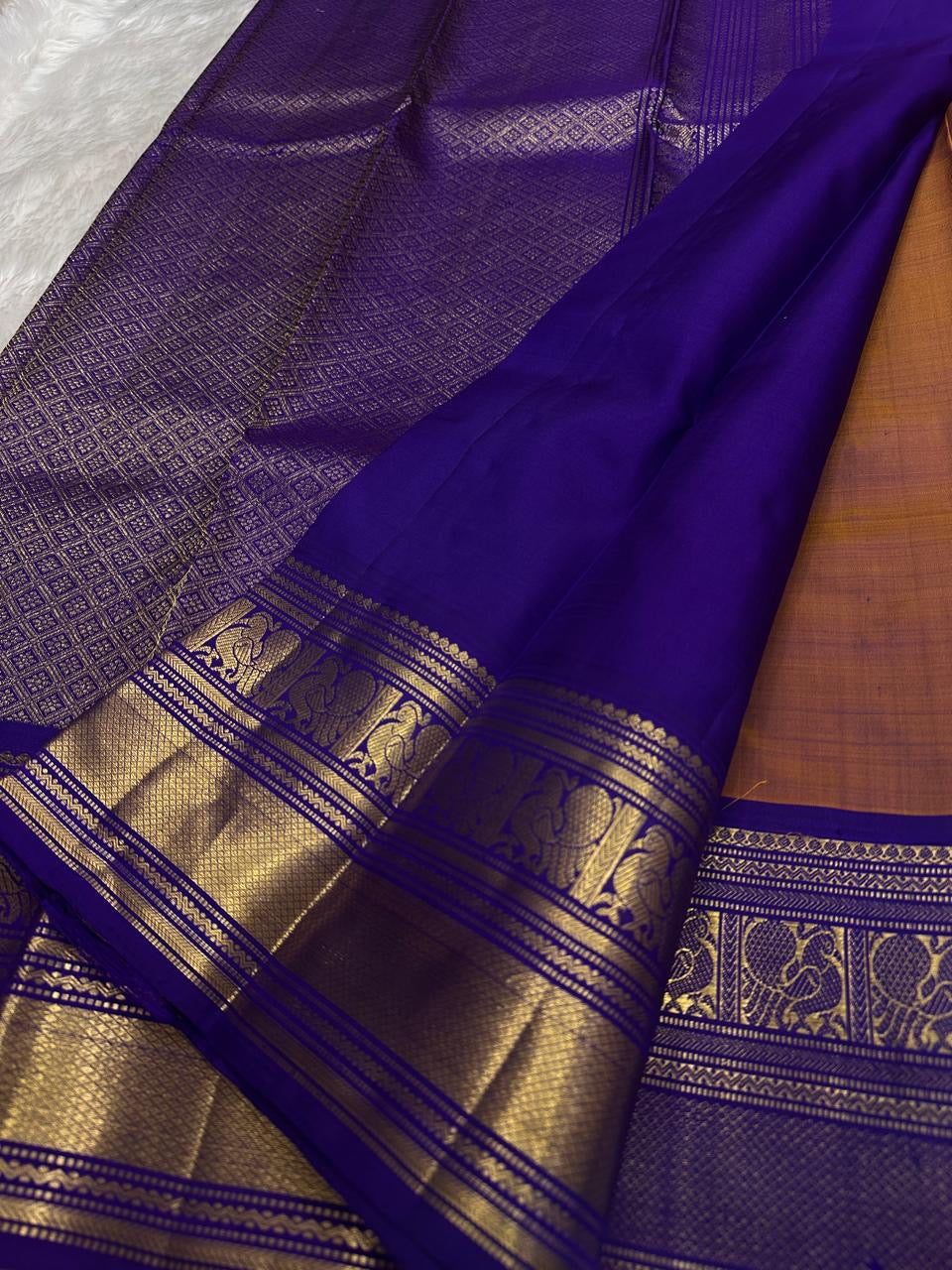 Royal violet korvai border Kanchipattu saree – folded view