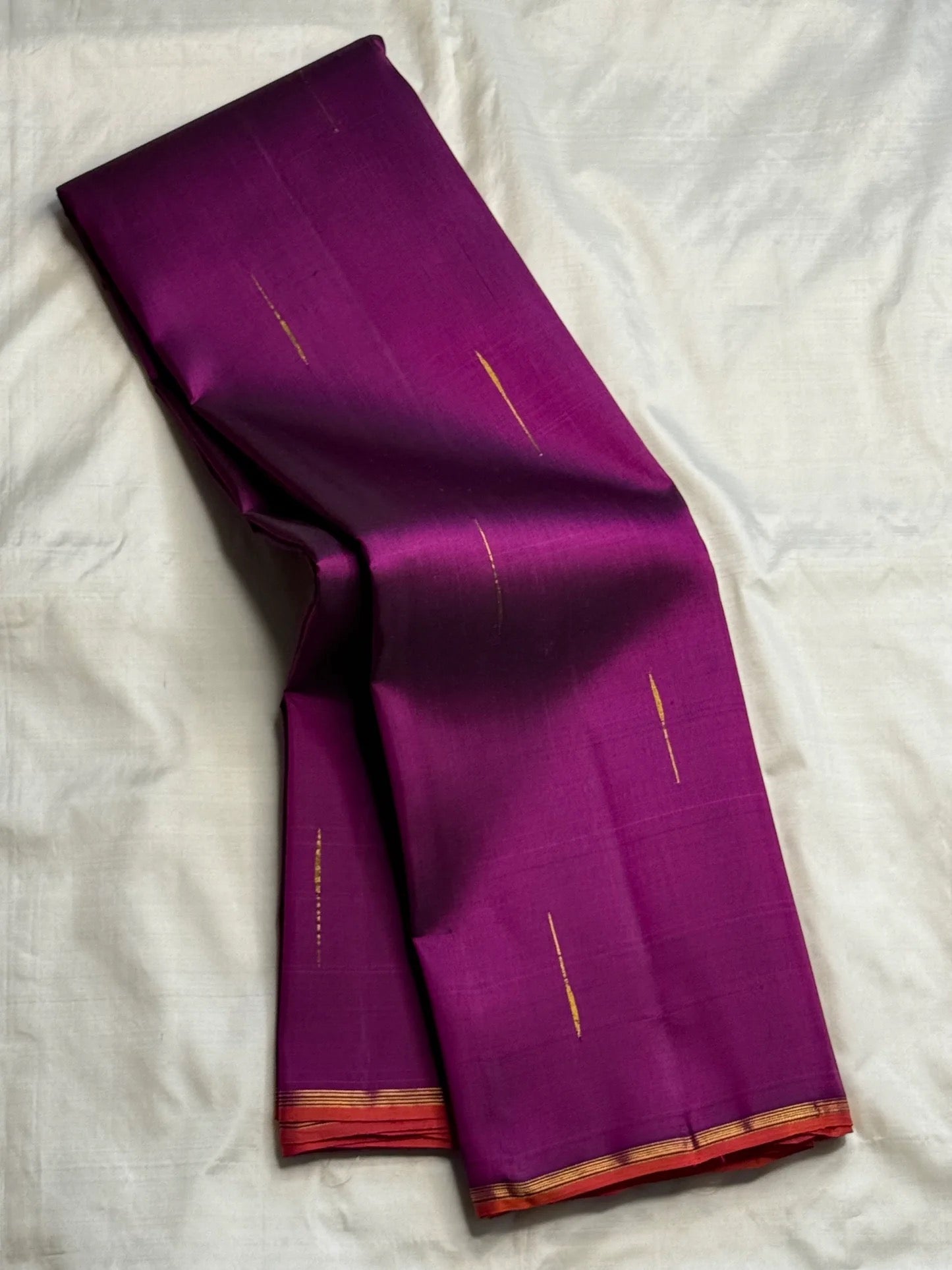 Magenta Violet Handwoven Pure Silk Kanjeevaram Saree with Malli Moggu Buttas and Coral Orange Pallu