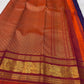 Fine gold Zari Kattam checks and buttas across the deep violet silk body