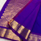 Purple silk saree with traditional zari peacock border and rich festive drape