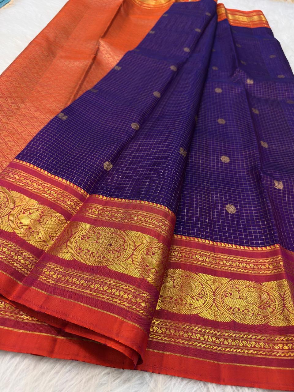 Gold zari detail on deep violet Kanchipuram pure silk