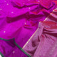 Vivid magenta handloom Pattu Silk Chanderi saree with metallic woven buttas, green edge and striped pallu