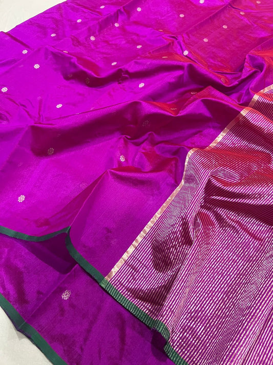 Vivid magenta handloom Pattu Silk Chanderi saree with metallic woven buttas, green edge and striped pallu