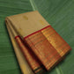 Warm Beige and Deep Vermillion Handwoven Pure Silk Kanchipattu Saree with Varisaipet Sorgavaasal Mayil Border